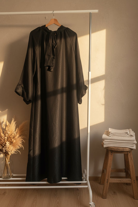 Glistening Black Balloon Sleeved Gown